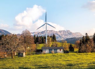 Wind, Sonne, Wasser: Die Zukunft der Erneuerbaren Energien Ein Windrad steht selten allein. Meistens gibt es ganze Windparks, die für nachhaltige Ernergieerzeugung sorgen.